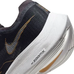Nike Men's ZoomX Vaporfly Next % 2 Racing Shoe - Black/White/Metallic Gold Coin - Regular (D) 15 Nike Men's ZoomX Vaporfly Next % 2 Racing Shoe - Black/White/Metallic Gold Coin - Regular (D) -Patagonia Shop CU4111 001 PHSYD002 1500