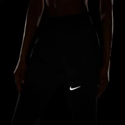 Women's Nike Therma-FIT Essential Running Pants - Black/Black/Reflective Silver 12 Women's Nike Therma-FIT Essential Running Pants - Black/Black/Reflective Silver -Patagonia Shop DD6472 010 PHSYM200 2000